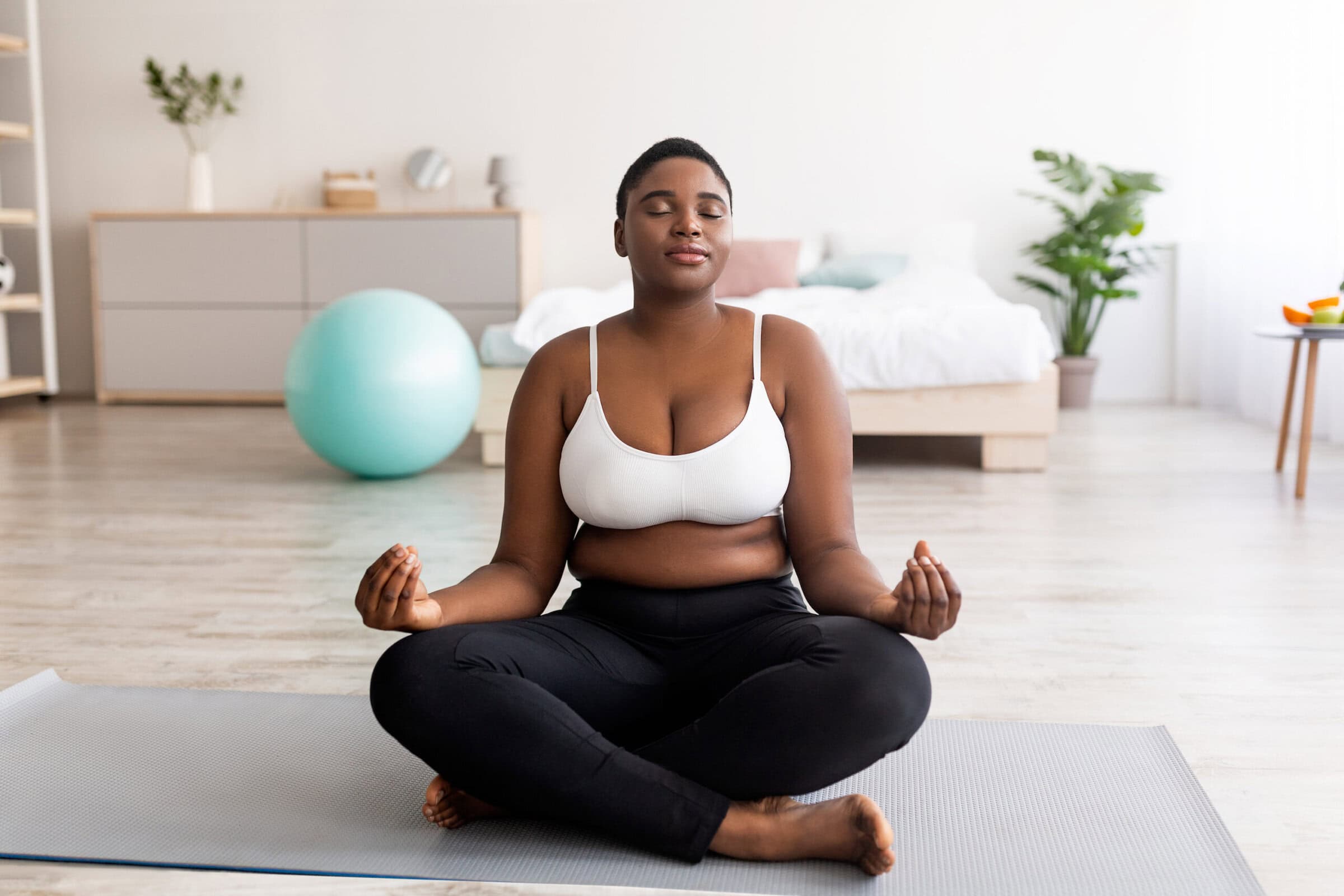 Plus,Size,Black,Woman,Sitting,In,Lotus,Pose,,Meditating,With Plus,Size,Black,Woman,Sitting,In,Lotus,Pose,,Meditating,With